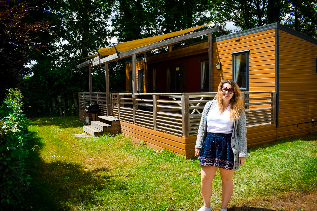 Breanne outside the Aspect mobile home by Eurocamp at camping la Garangeoire