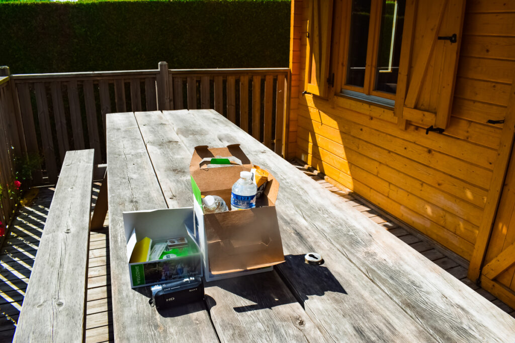 outside table with eurocamp welcome pack on at la croix du vieux pont berny riviere