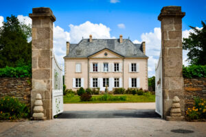 Castels Camping la Garangeoire Review photo of the manor house with a blue sky background
