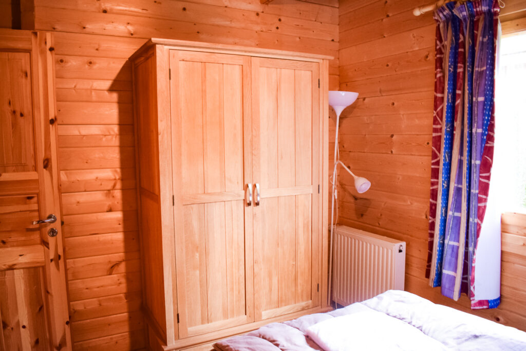 Wardrobe in the downstairs double bedroom of the wooden 4 bedroom villa lodge at la croix du vieux pont in berny riviere with eurocamp