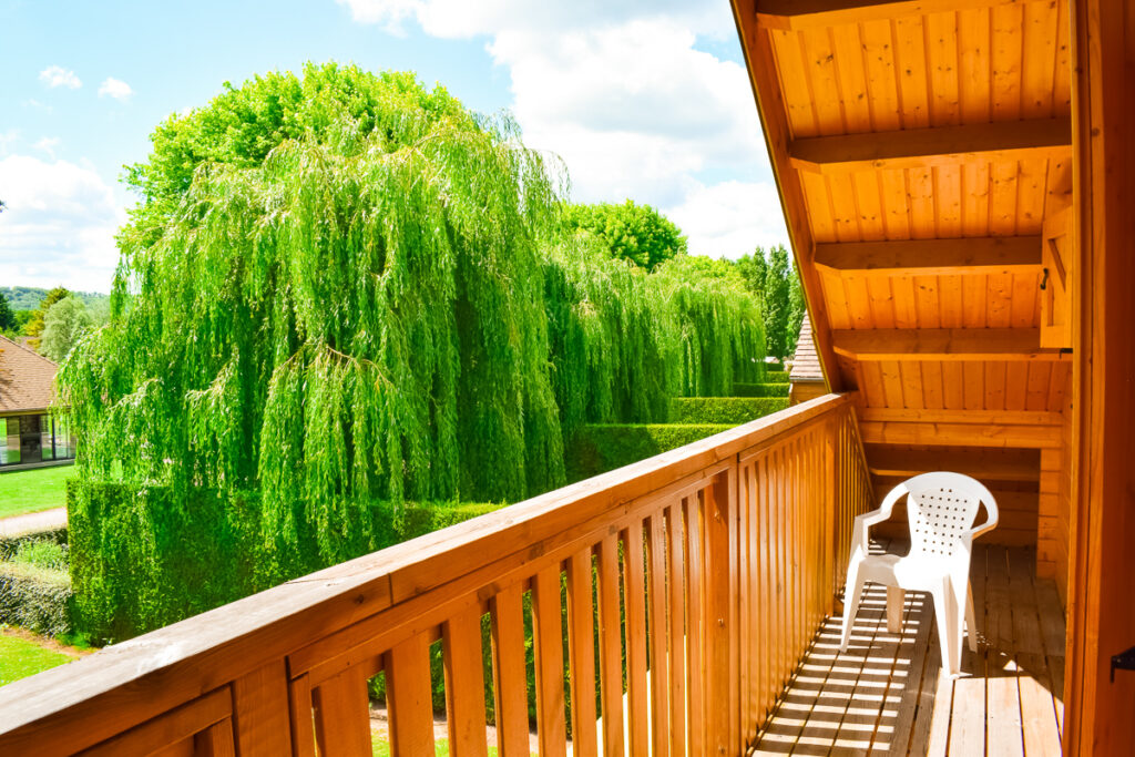 Balcony from the main upstairs bedroom at eurocamp la croix du vieux pont berny riviere