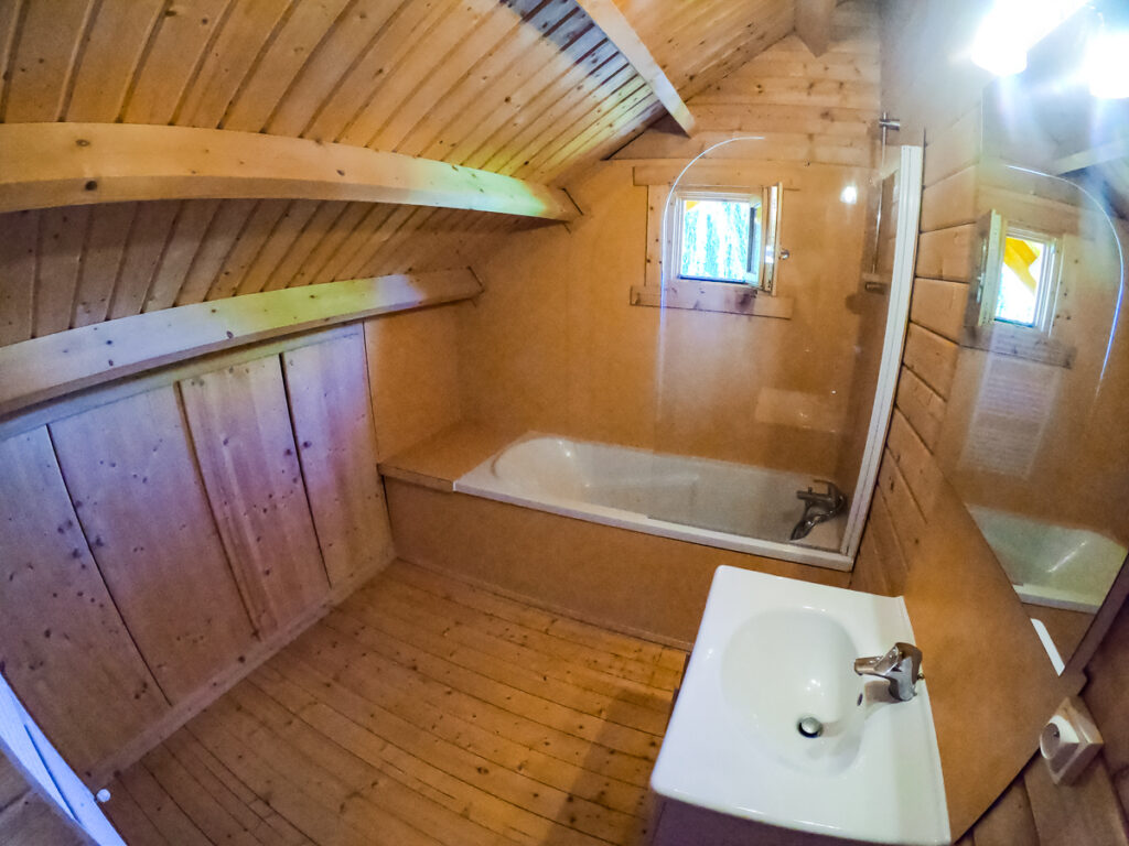 Bathroom upstairs with actual bathtub at la croix du vieux pont campsite in berny riviere. Inside the 4 bedroom wooden lodge from eurocamp