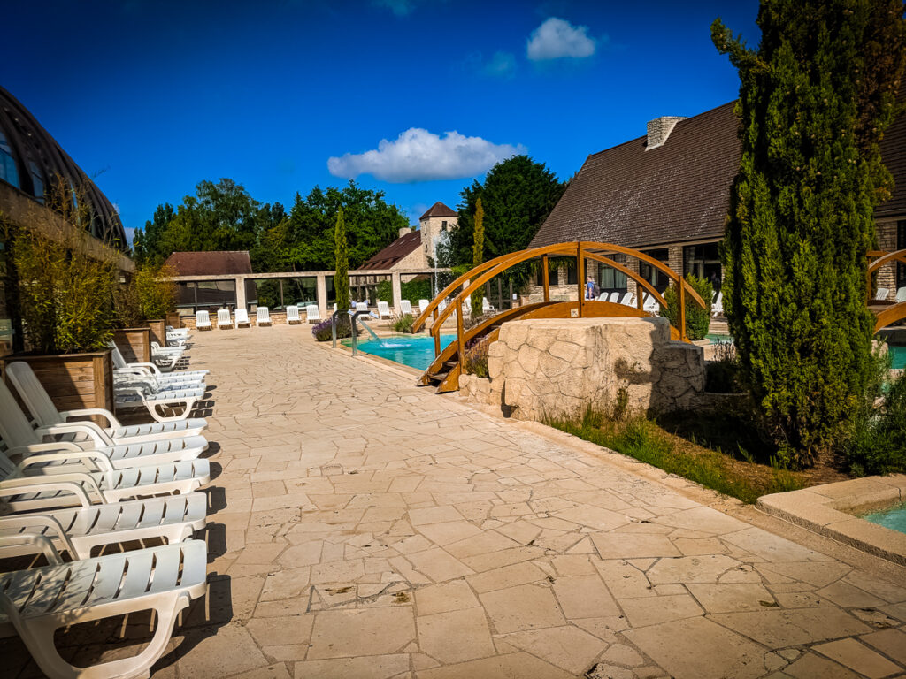 The outdoor pool area at La Croix du vieux pont berny riviere france (61)