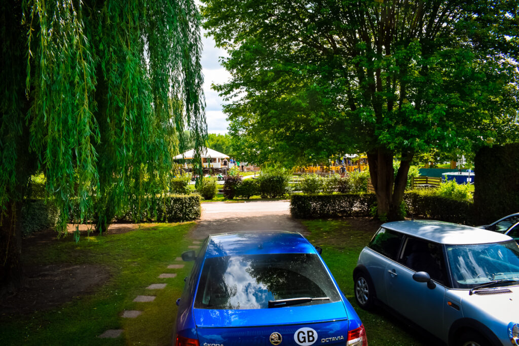 The parking situation on our lodge pitch at La Croix du vieux pont berny riviere france we fit 3 cars on the emplacement and still had plenty of space