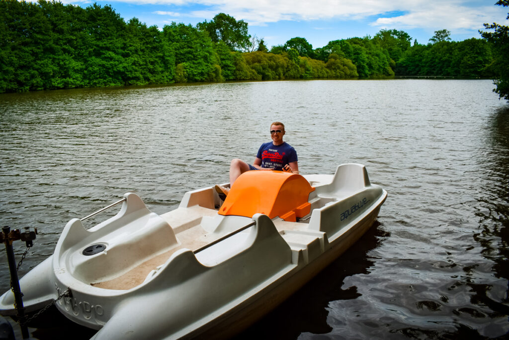 a pedalo with mike sat on it at the lake at la garangeoire