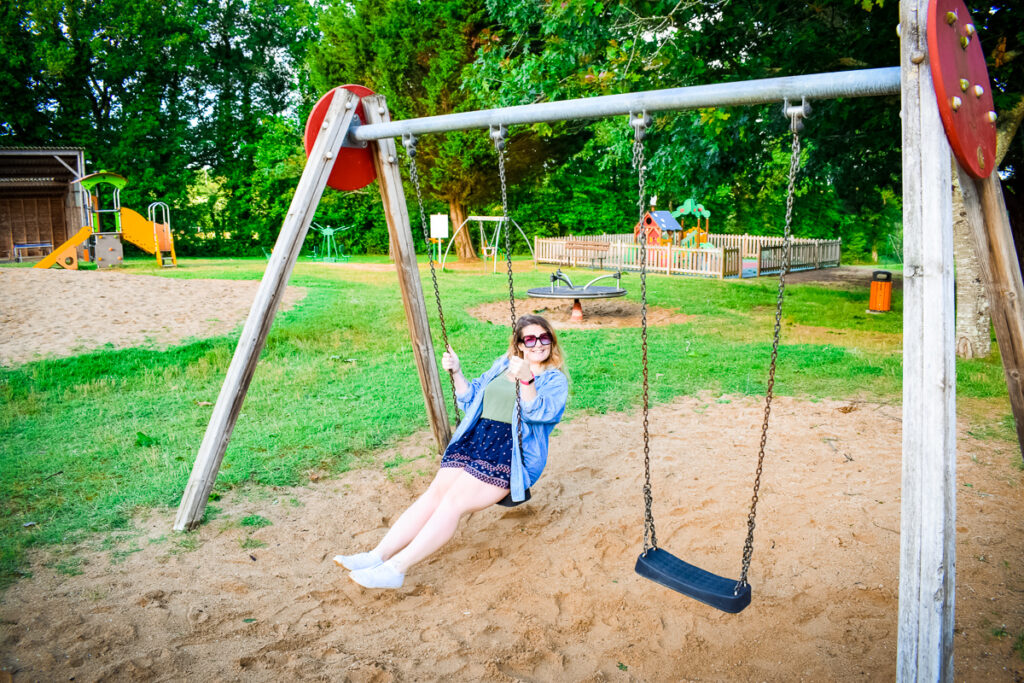 breanne on a swing at camping la garangeoire