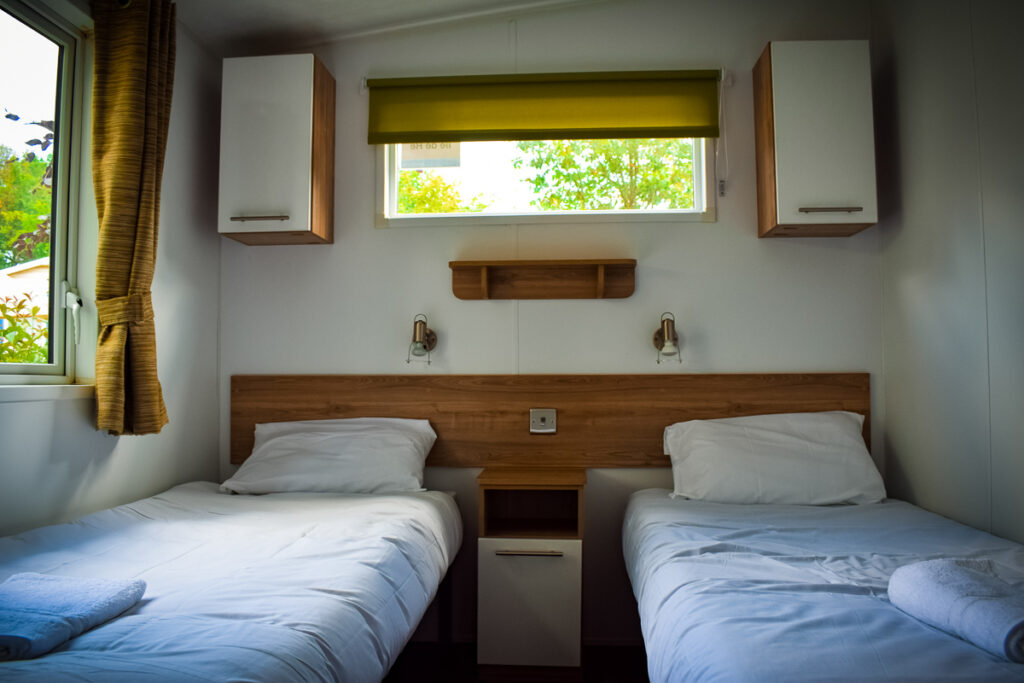 aspect mobile home twin bedroom at camping la garangeoire with eurocamp