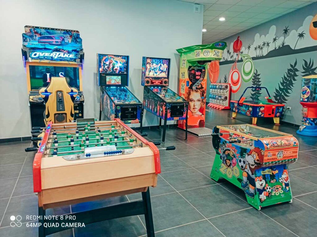 another arcade room photo featuring table football and other games Camping de l'ocean Brem Sur Mer