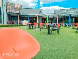 outdoor bar area seating at Camping de l'ocean Brem Sur Mer