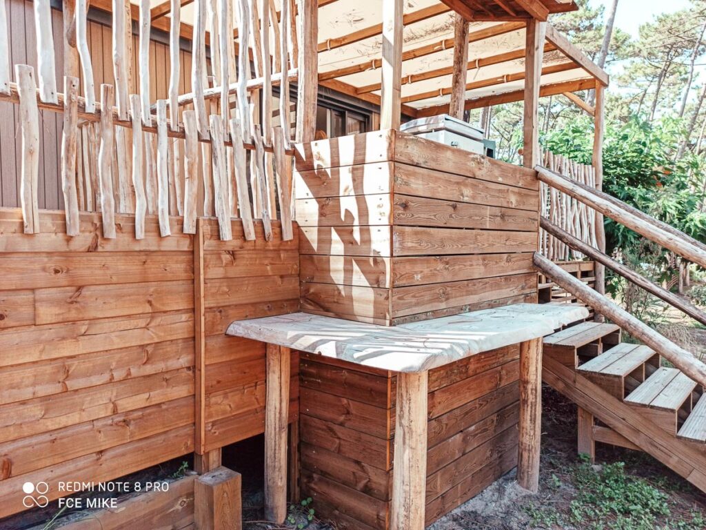 Outside bar area in our 4p premium lodge mobile home accommodation at Camping le Vieux Port Landes france