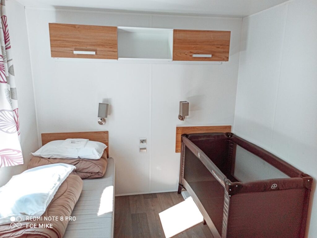 twin bedroom in our Eurocamp PREMIUM (Formerly Azure Plus) 2 bedroom from Eurocamp at Camping des menhirs