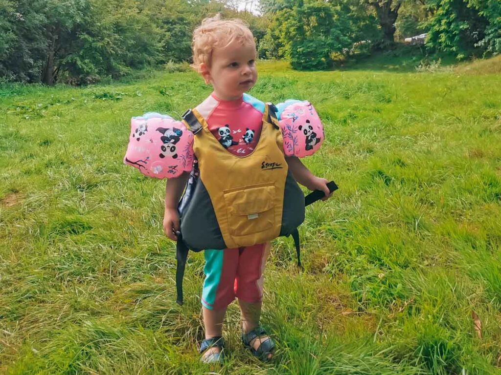 The toddler in her oversized life jacket at yelloh village la roche posay