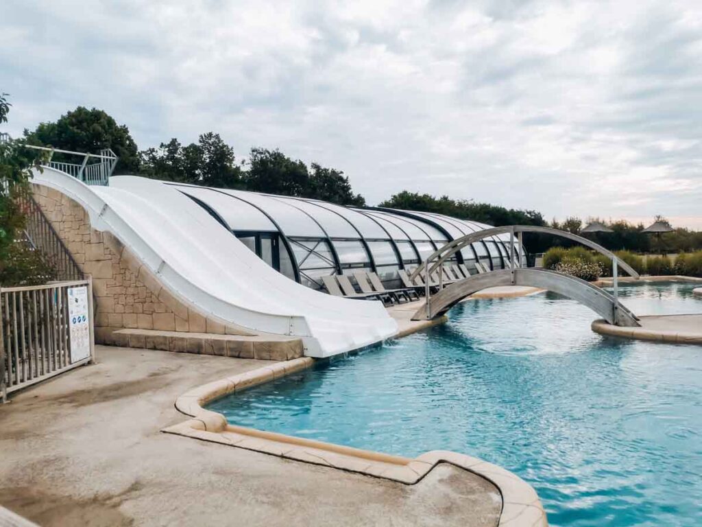 The 3 fast water slides into the water pool at yelloh village la roche posay