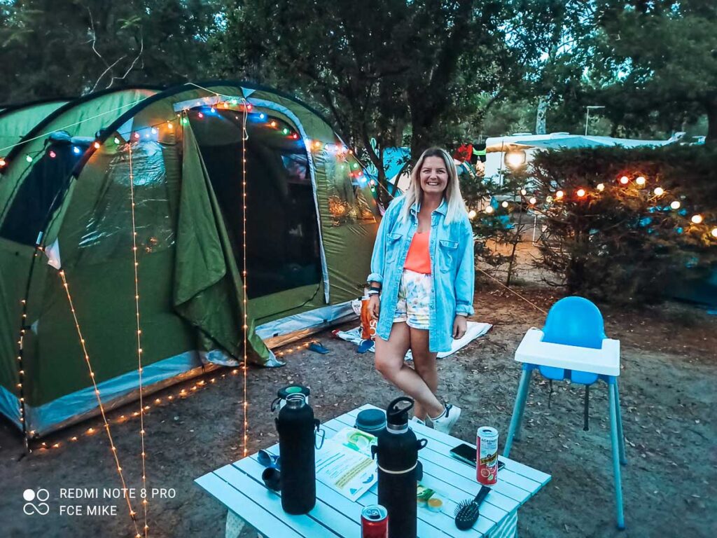 Breanne stood outside the tent with lots of coloured lights