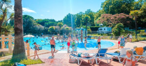 photos around the pool area at le ruisseau campsite