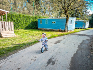 cycling past mobile homes at les ormes