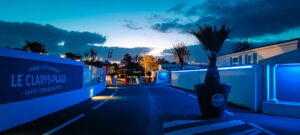 clarys plage entrance at night time