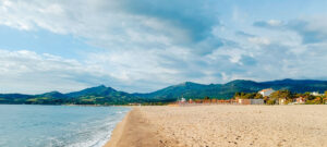the beach in argeles sur mer with crystal clear water and golden sand