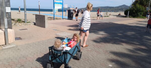 pulling the children in a truck to the beach at argeles sur mer