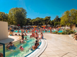 very busy pool area at la yole campsite valras plage