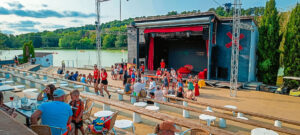entertainmnet team at the stage area of Le Lac des 3 Vallées