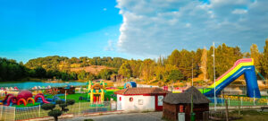 lake and bouncy castle park at Le Lac des 3 Vallées