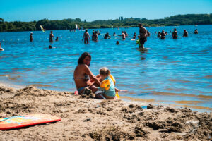 nanny and toddler at lac de leon in the landes of france