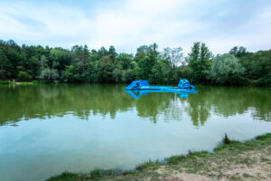inflatables on the lake at parc de fierbois