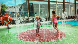 playing at the pool splash area