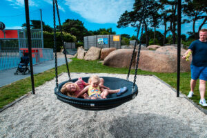 The swing outside of baby club at le ranolien campsite