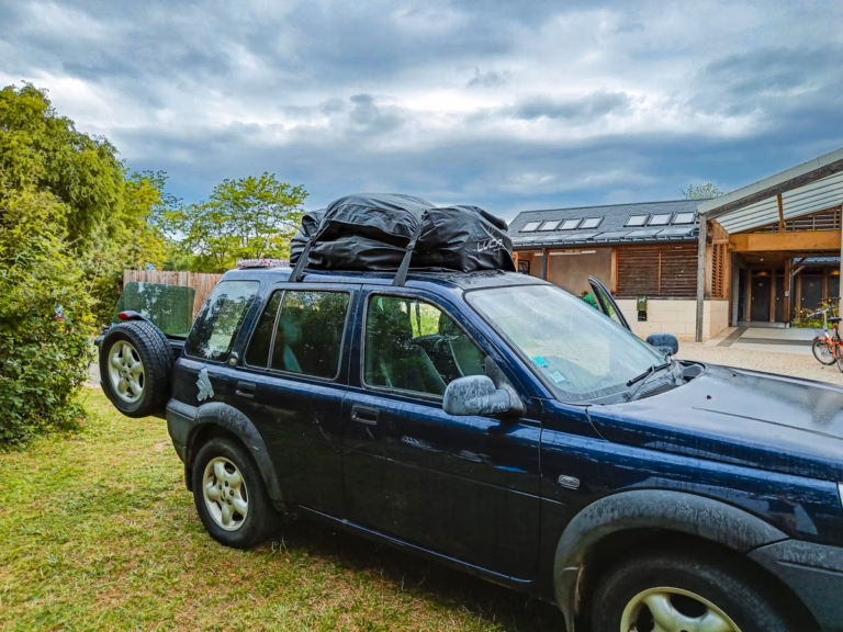 fully packed car on a campsite