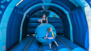 Bouncy castle inside Camping Bel pool area