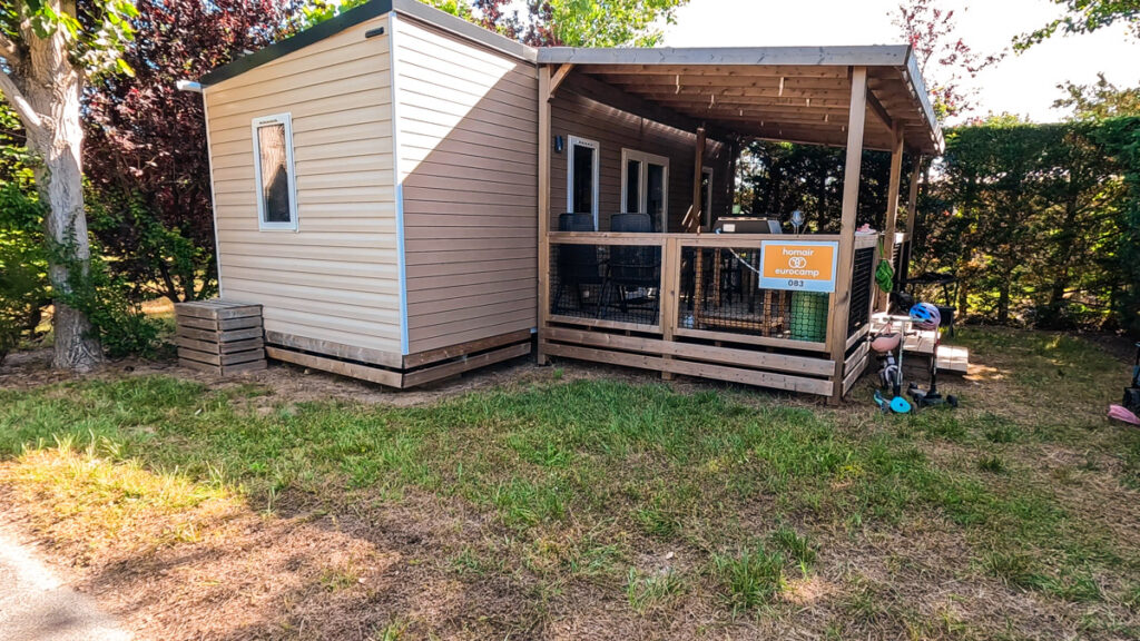 Green space outside Eurocamp mobile home at Camping Bel