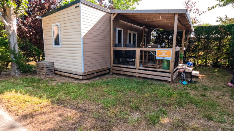 Green space outside Eurocamp mobile home at Camping Bel