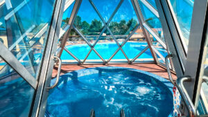 Jacuzzi in glass pyramid at Camping Bel pool