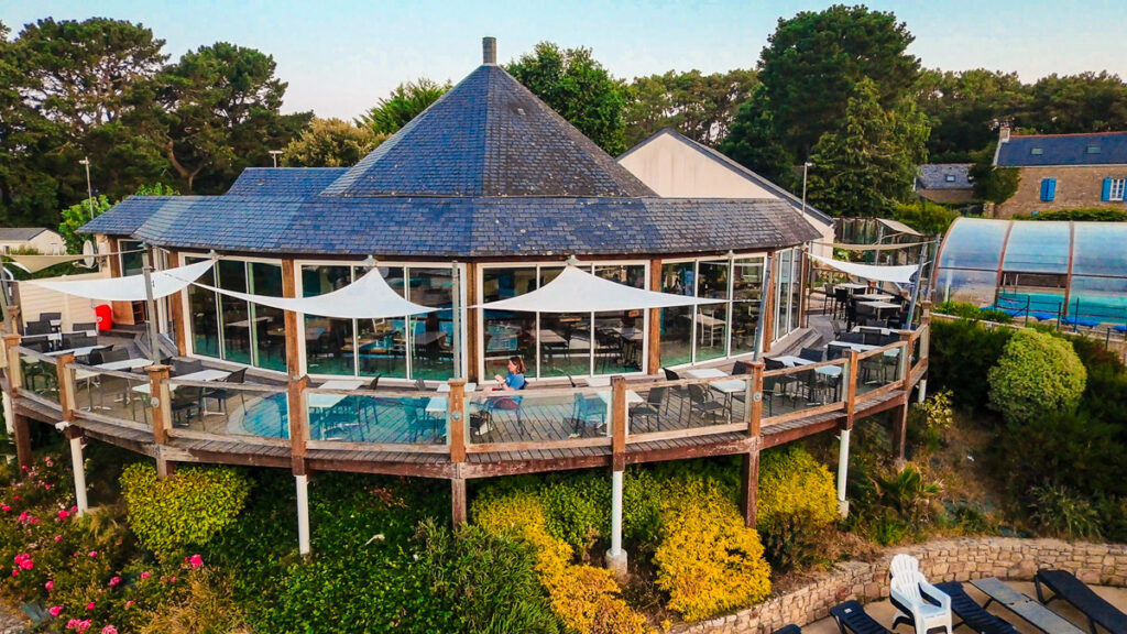 drone image of the main restaurant area which overlooks the pool at La Grande Metairie