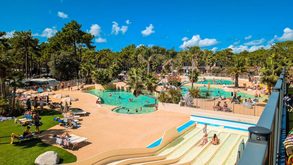 waterslides and swimming pools on aerial view of camping cote d'argent