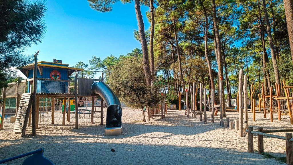 The main kids play area at camping cote d'argent with slides and play structures