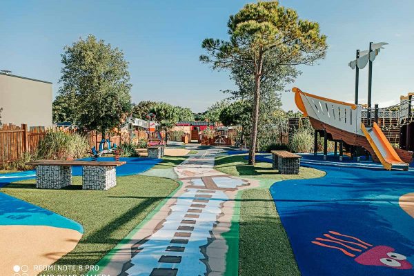 new outdoor play area with fun coloured and patterned floor at Camping de l’ocean Brem Sur Mer new outdoor play area with fun coloured and patterned floor at Camping de l'ocean Brem Sur Mer